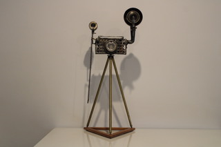 A camera sculpture made of various components