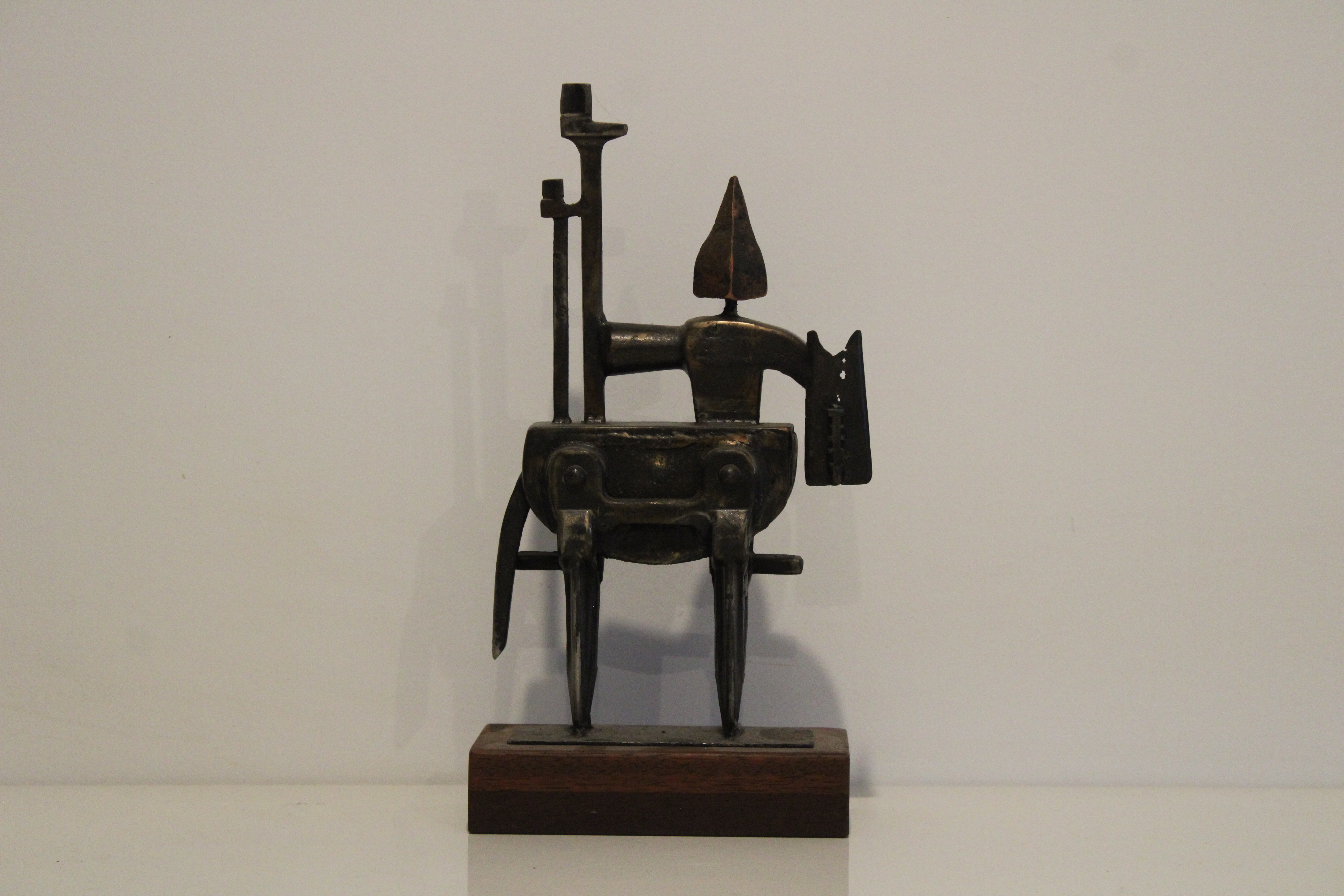 Abstract sculpture of a figure with a humanoid torso and a horse body