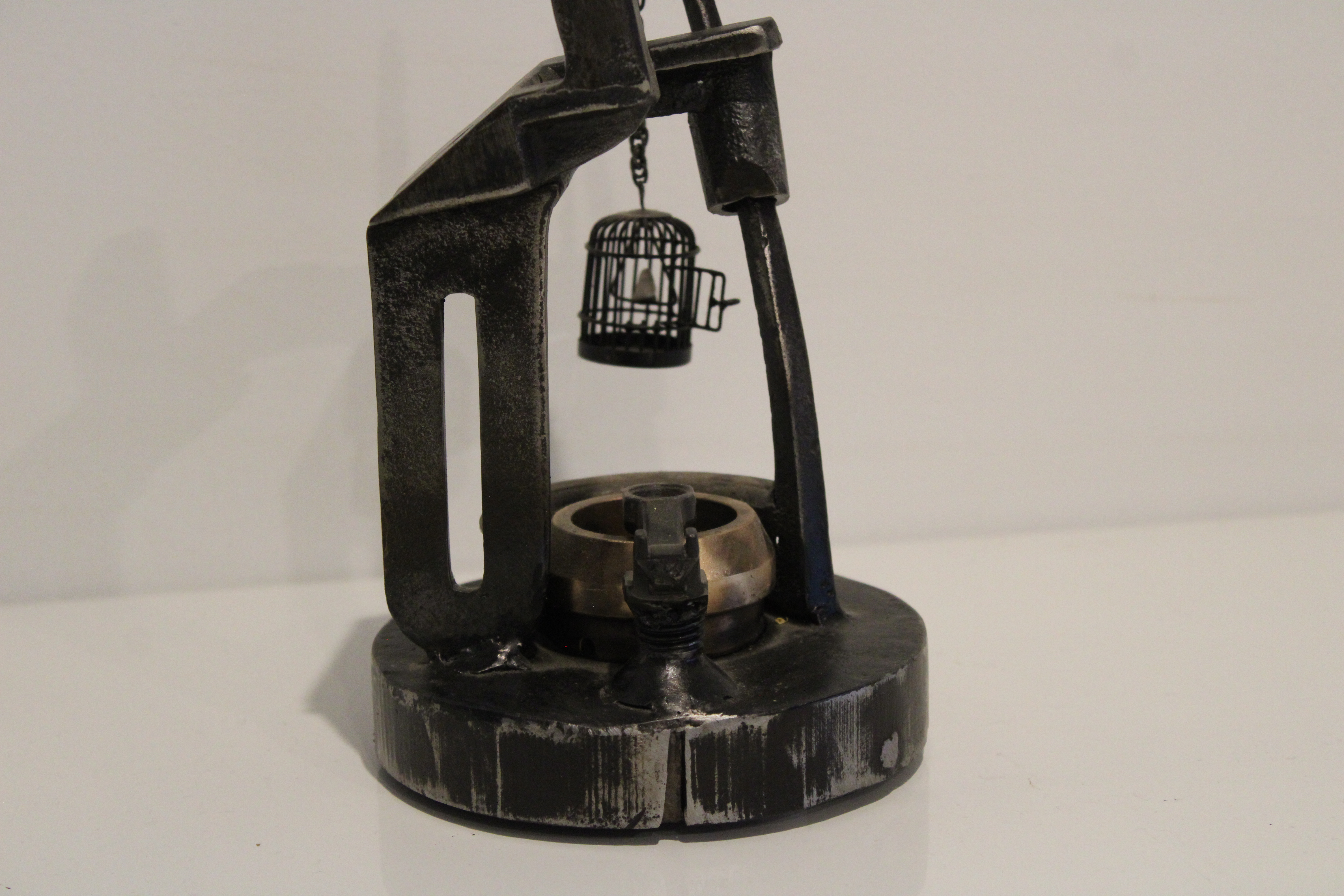 Close-up angle view of Keeper of the well sculpture