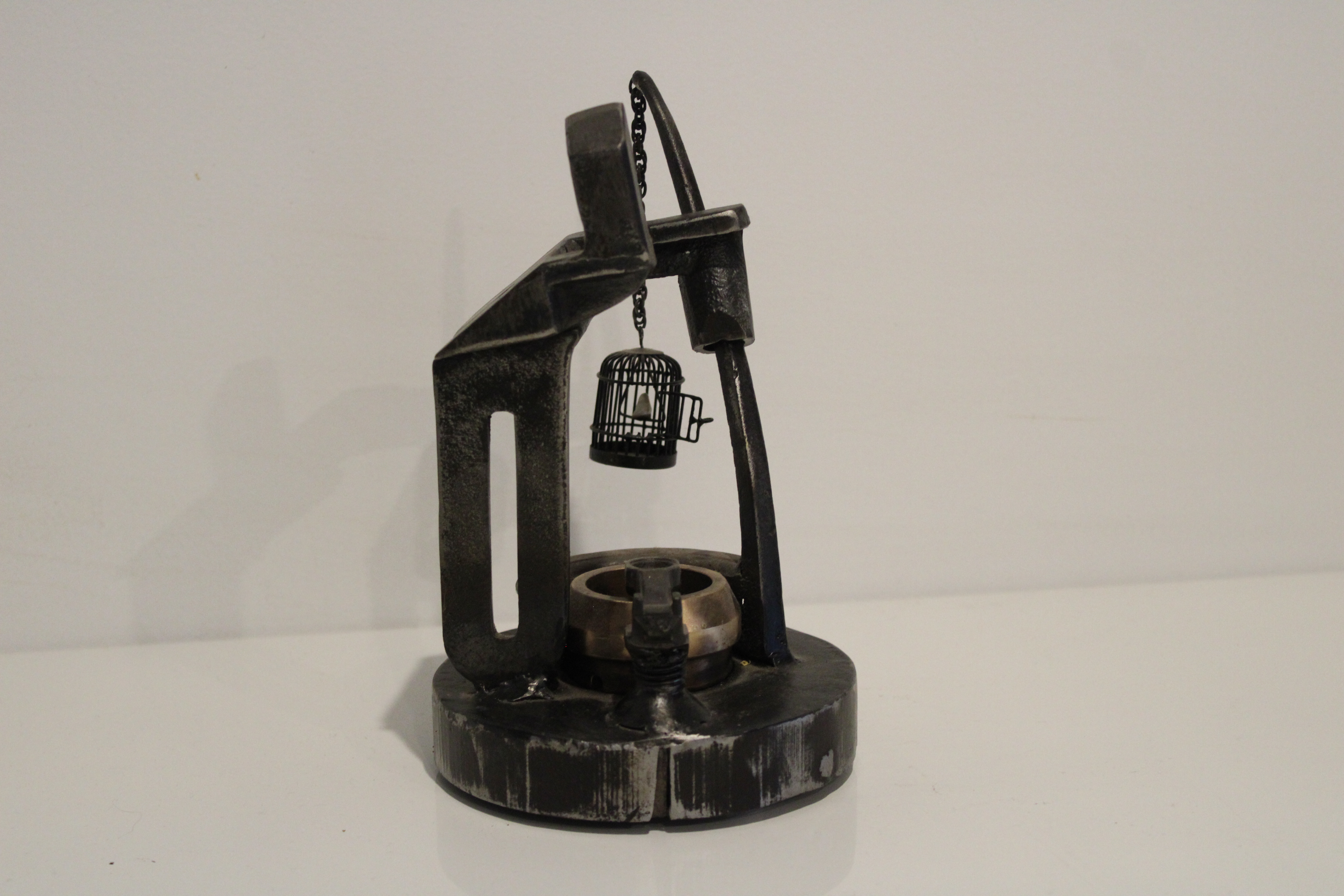 Side view of Keeper of the well sculpture