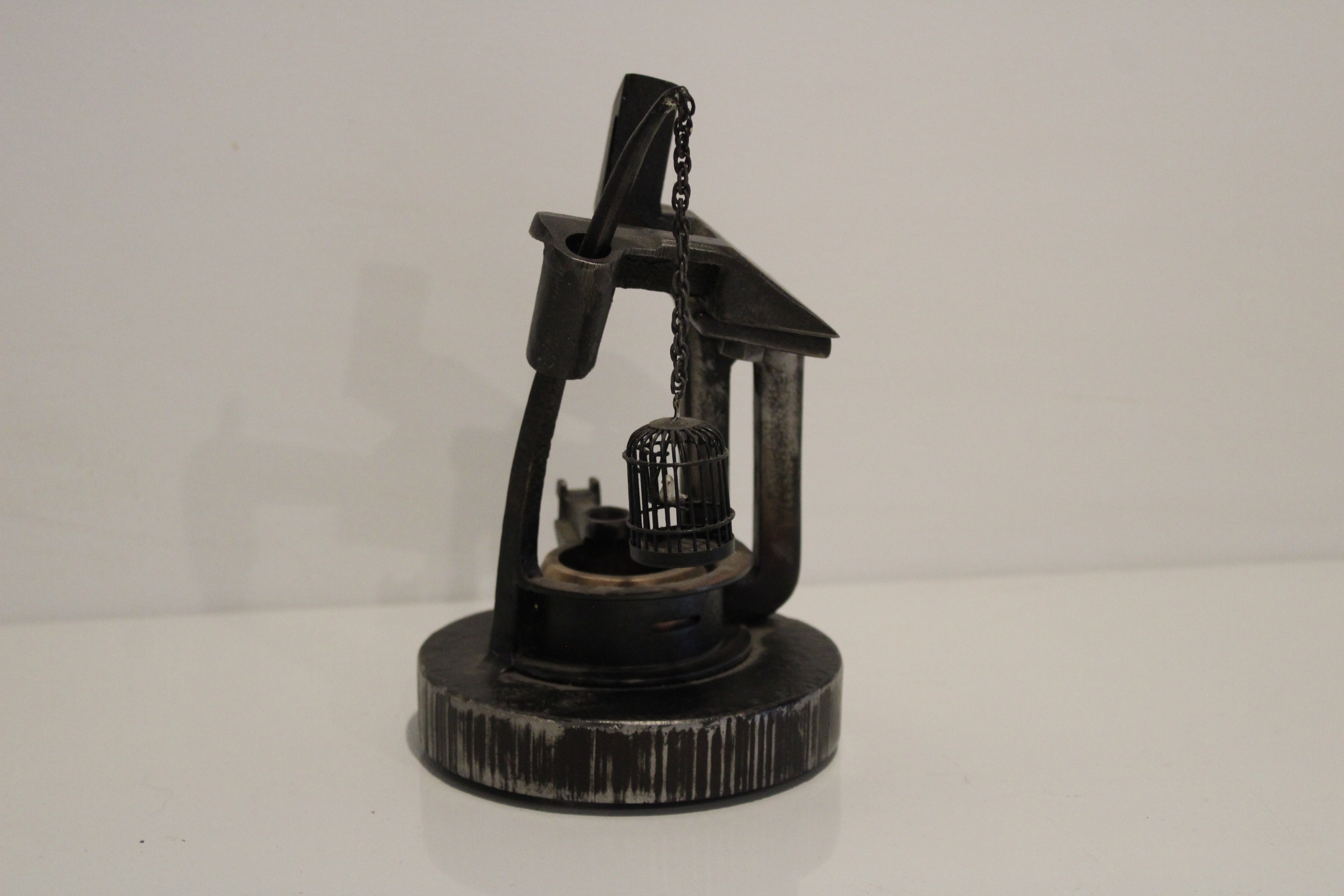 Right side view of Keeper of the well sculpture